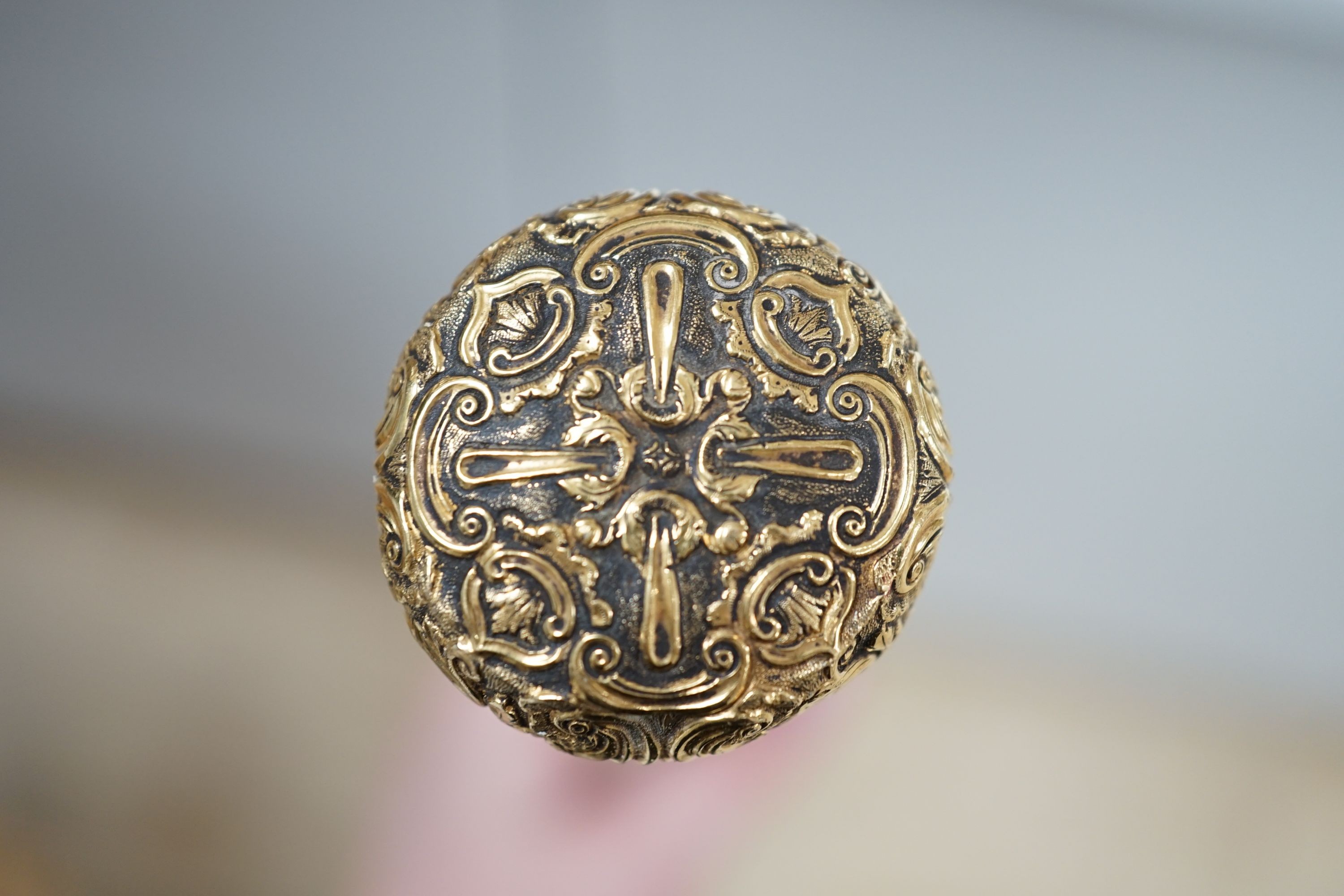 A 19th century malacca walking cane, with embossed yellow metal mount, 95cm.